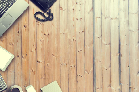 Top view of Business still life on old wooden table background. Vintage tone with Copy Space