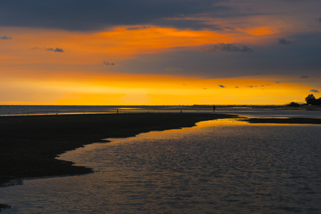 Beach and sea with twilight sky at Chao Lao Beach at Chantaburi Thailand. Summer concept with orange sky sunset scenceの写真素材