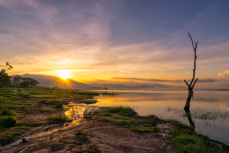 Landscape of the lake in sunrise scence with beautiful sky and clouds.の写真素材