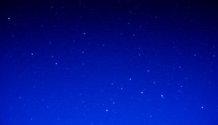 Night sky with stars sparkling on black backgroundの写真素材