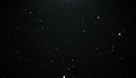 Night sky with stars sparkling on black backgroundの写真素材