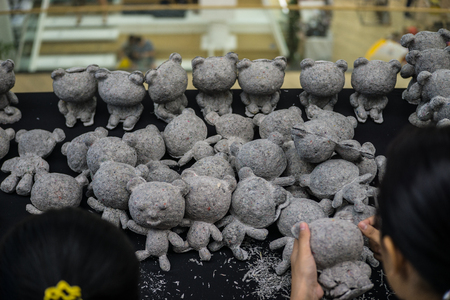 Vulunteer make Paper Mache Toys for Autistic Kidの写真素材