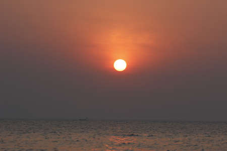 Sunset, also known as sundown, is the daily disappearance of the Sun below the horizon due to Earth's rotationの写真素材