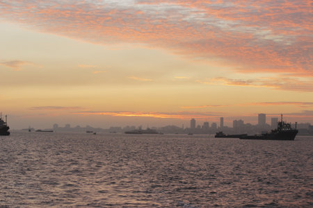 Sunset, also known as sundown, is the daily disappearance of the Sun below the horizon due to Earth's rotationの写真素材