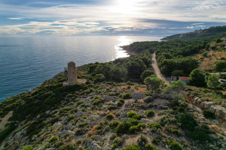 Drone view of an ancient medieval tower of Mediterranean Sea coast defence in Spain. Torre de la Corda in Oropesa, Spainの写真素材