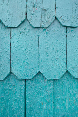 Vertical color close-up image of old wooden tile pattern facadeの写真素材