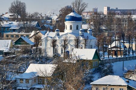 krestovozdvijenskaya Church in Mogilev on the background of winter city landscape
