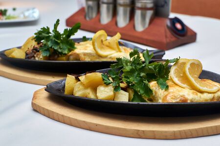 Perch fillet with baked potatoes