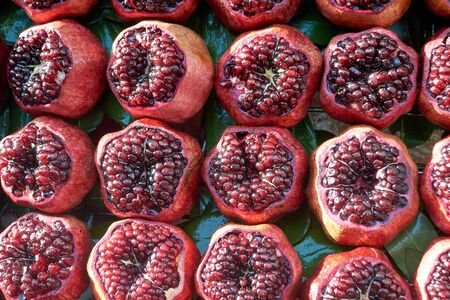 Ripe red pomegranates closeupの写真素材
