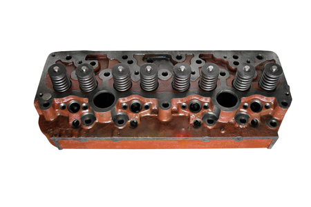 Car engine cylinder head isolated on white background