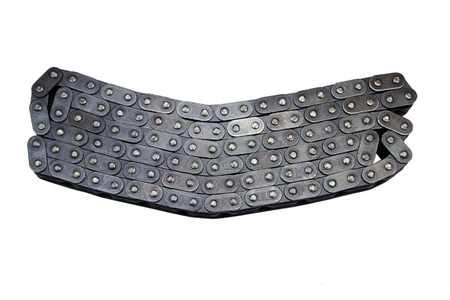 part of a used automotive gear chain isolated on white background