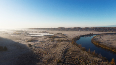 Aerial drone view, of the river among the fields.の写真素材