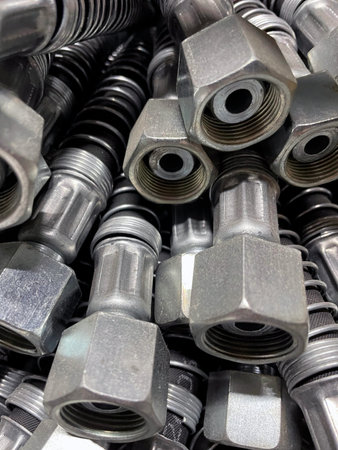 Close-up of a bunch of stainless steel fittings for the pipeline.