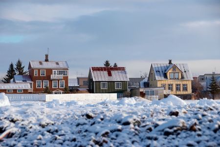 Three coloured houses with snow in Reykjavik, Icelandの写真素材