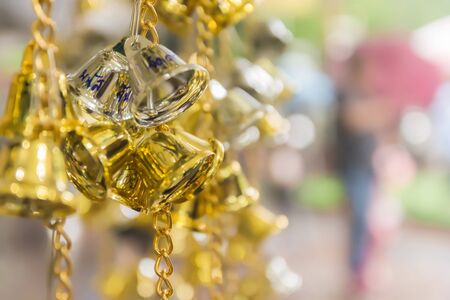 Prayer Bells. Thailand. Golden and bronze bell. Buddhist bells lucky charms in Thailand. If write name on belief you will luck and succeed. Wat Rai Khing, Nakhon Pathom. Thailandの写真素材
