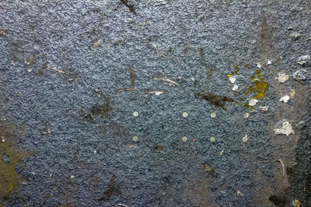Abstract metal texture covered with scratches and old paintの写真素材