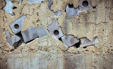The surface of an old concrete wall