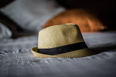 Hat Straw on bed, still lifeの写真素材