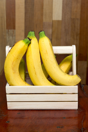 Bananas in a basketの写真素材