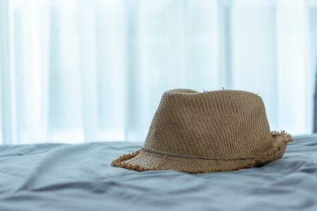 accessories for the holiday,Hat weave on bed in the bedroomの写真素材