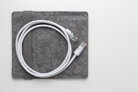 LAN network connection RJ45 cable isolated on white.の写真素材