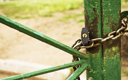 lock with a chain on the gateの写真素材
