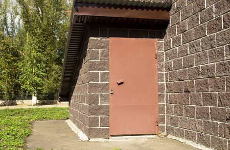 a closed door in the basement of the houseの写真素材