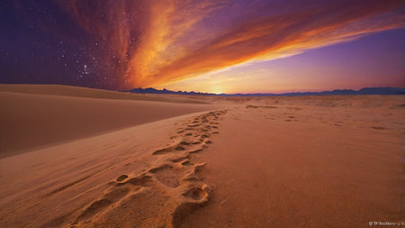 Landscape of sand dunes at sunsetの写真素材