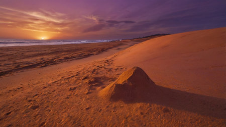 Beautiful sunset over the sand dunes in Mui Ne, Vietnamの写真素材