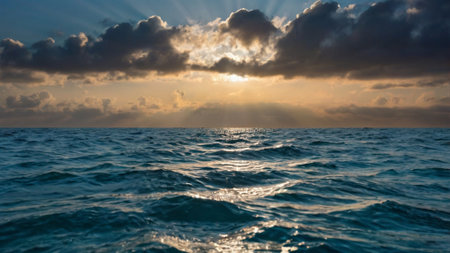 Sunset over the sea. Seascape with sun rays.の写真素材