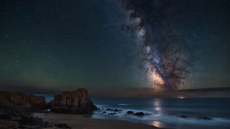 Milky way over the sea at night. Long exposure photograph.の写真素材