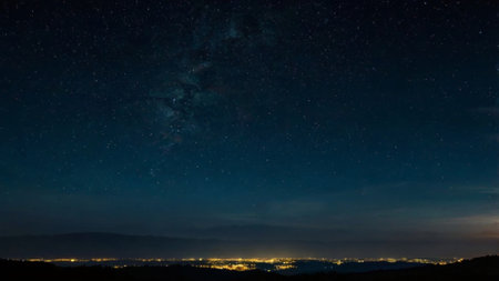 Night sky with stars and milky way. Long exposure photograph.の写真素材