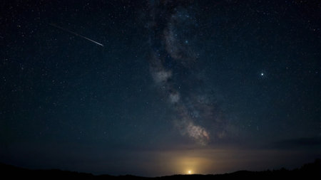Night sky with stars and milky way. Long exposure photograph.
