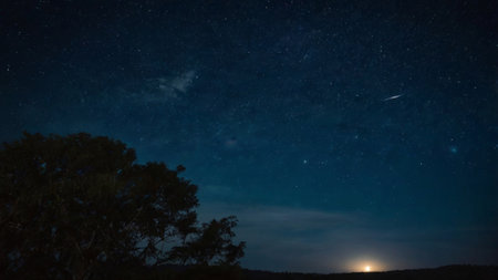 Night sky with stars and milky way. Long exposure photograph.の写真素材