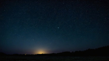 Night sky with stars and milky way. Panoramic view.
