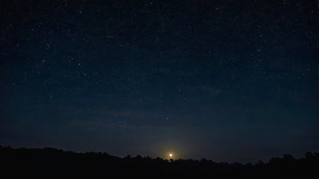 night sky with stars and milky way. Long exposure photograph.