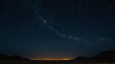 Night sky with stars and milky way. Long exposure photograph.