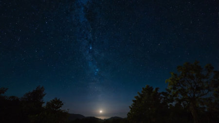 Night sky with stars and milky way. Long exposure photograph.の写真素材