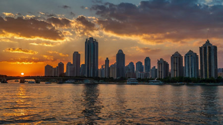 Dramatic sunset over the skyscrapers in Guangzhou, Chinaの写真素材