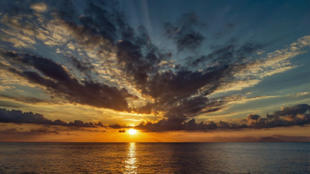 Beautiful sunset over the sea. Seascape with clouds.の写真素材