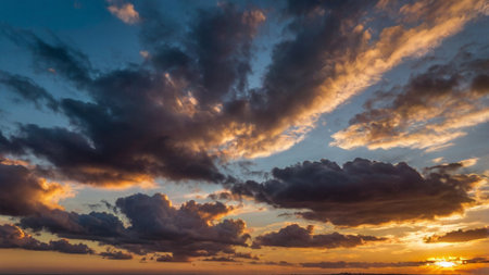 Cloudscape, Colored Clouds at Sunset near the Ocean on a Cloudy Day