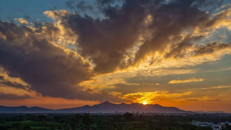 Sunset over the mountains in Hampi, Karnataka, Indiaの写真素材