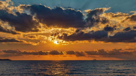 Beautiful sunset on the sea with clouds and sky. Nature backgroundの写真素材