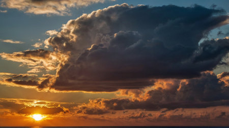 Cloudscape, Colored Clouds at Sunset near the Ocean on the Beachの写真素材