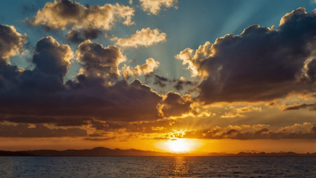 Sunset over the sea. Dramatic sky and beautiful clouds.の写真素材