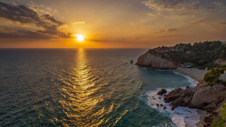 Aerial view of beautiful sunset over the sea in Costa Brava, Catalonia, Spainの写真素材