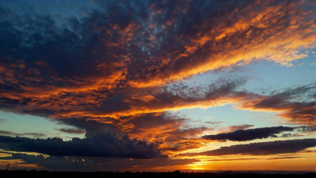 Dramatic sunset sky with clouds. Colorful sky with clouds at sunset.