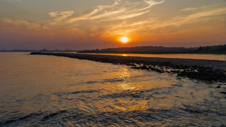 Sunset over the river in the summer. Beautiful natural landscape.