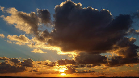 Cloudscape, Colored Clouds at the Sunset near the Ocean Coast