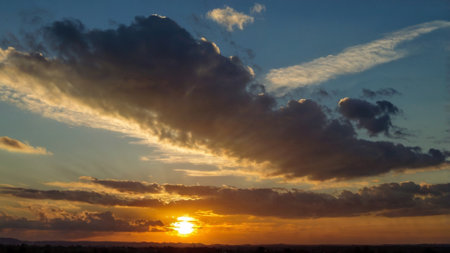colorful dramatic sky with cloud at sunset.Skyline at sunset.